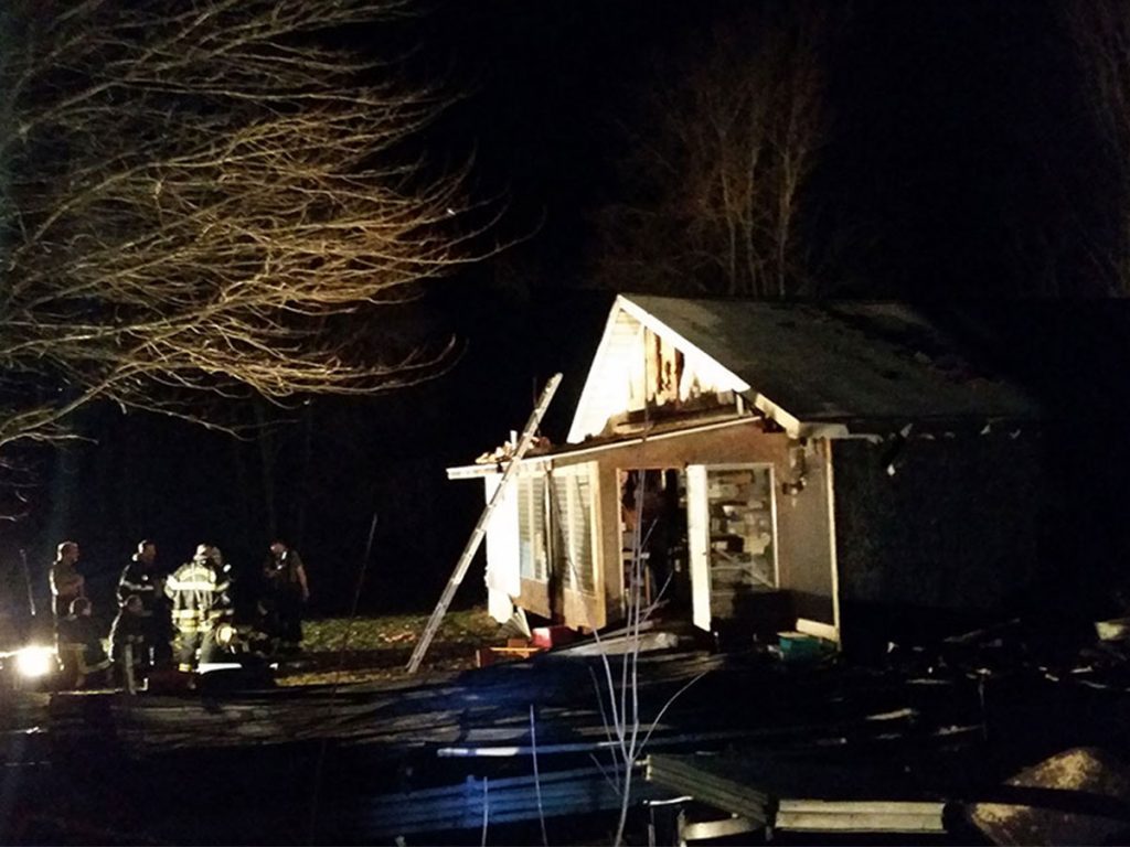 Firefighters from Cochranton finish fighting a fire in this commercial building. Photo courtesy of West Mead 1 VFC