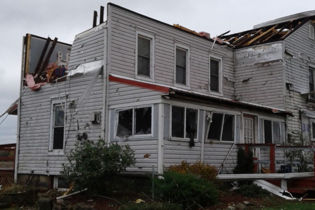 Tornado damage to a single-family house in Williamsfield, OH